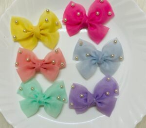 Medium Kids Pearl Bow Pin